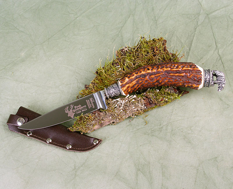 Trachtenmesser, Hirschhorngriff mit versilberter Figurkappe Trachtenmesser, Hirschhorngriff mit versilberter Figurkappe